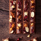 NESTLE chocolat au lait raisins, amandes et noisettes